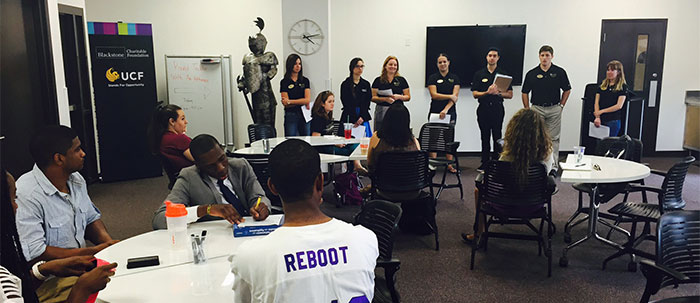 The #UCFBusiness Student Ambassadors talk with students interested in the program.